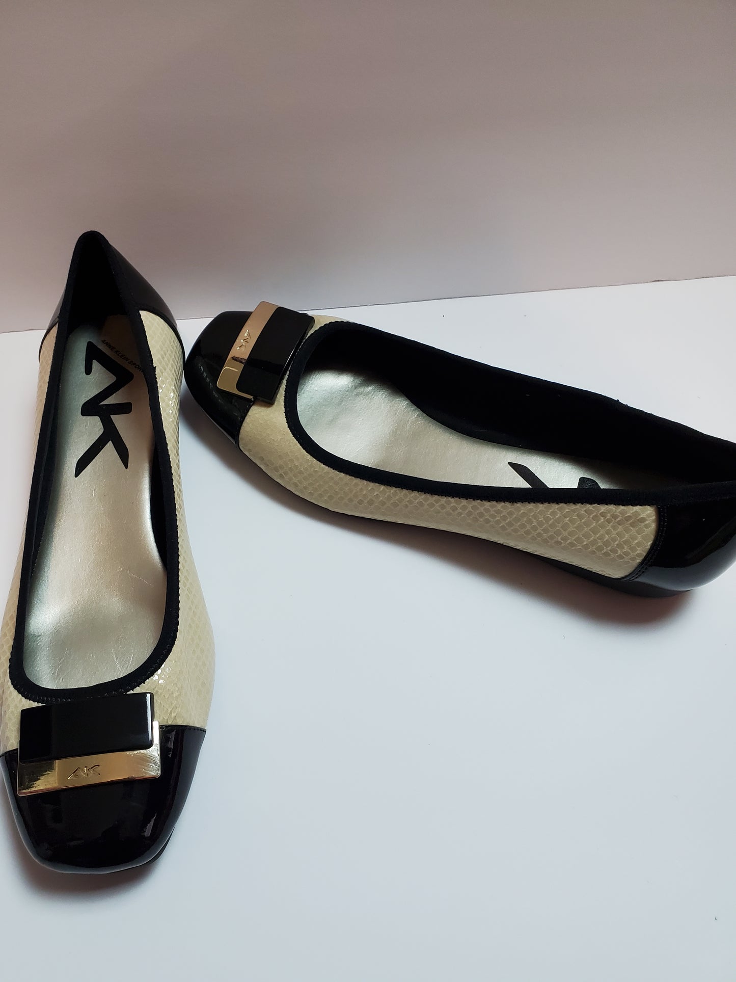 Black and cream flats